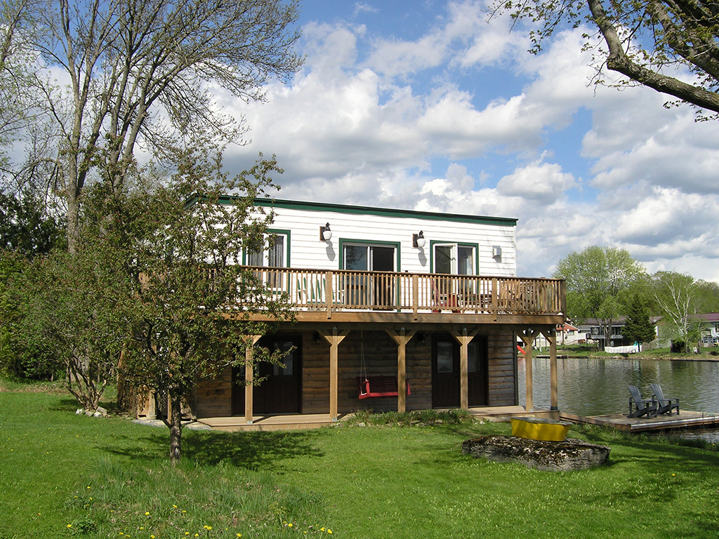 a view of the boathouse from the front